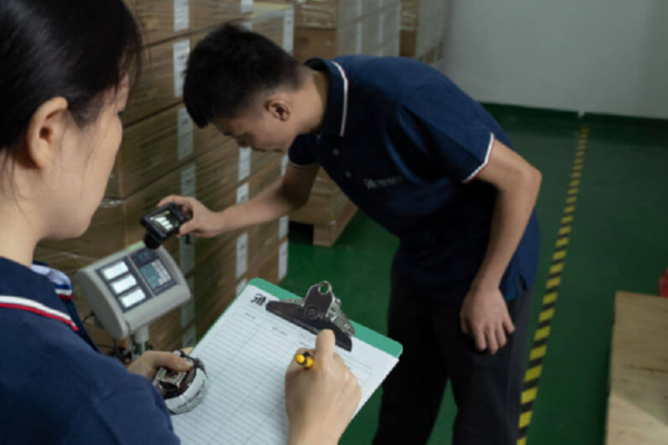 Quality Assurance Team Inspecting Bags